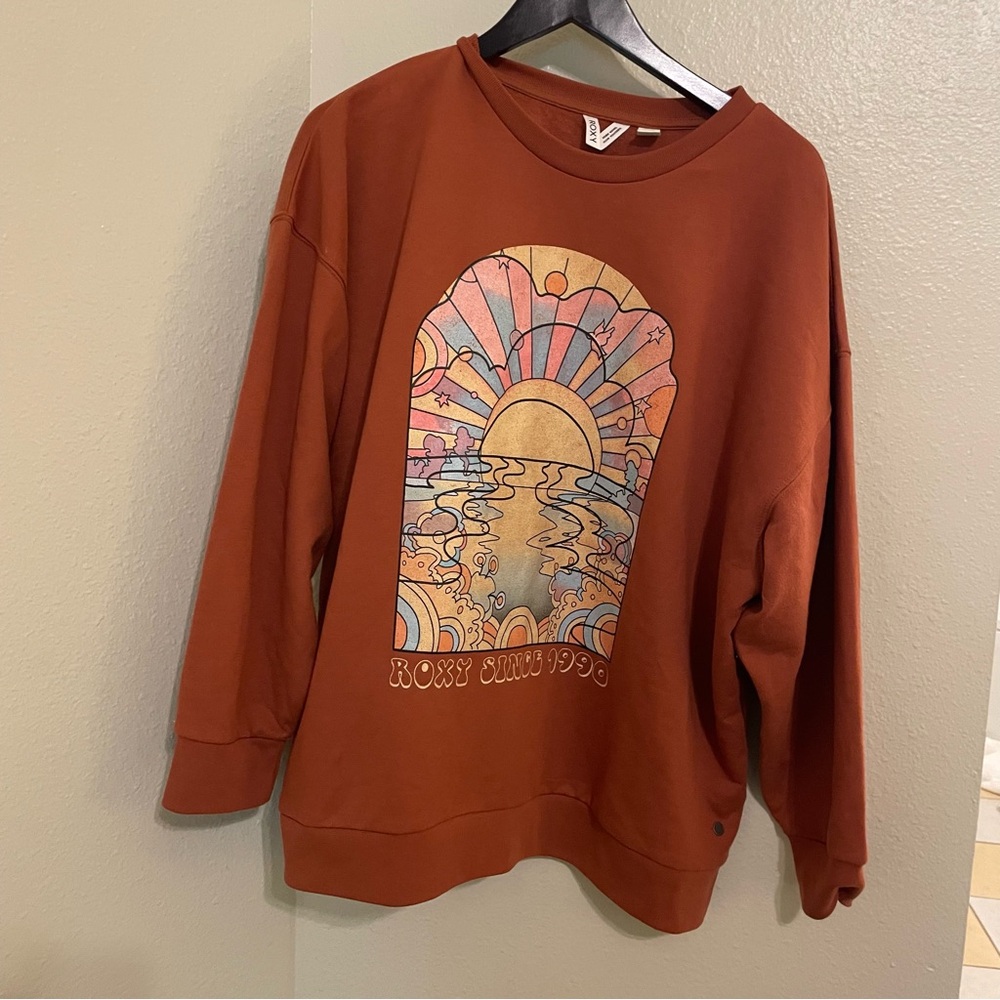 Roxy Rust Graphic Crewneck Sweatshirt with Pastel Sunset Print
